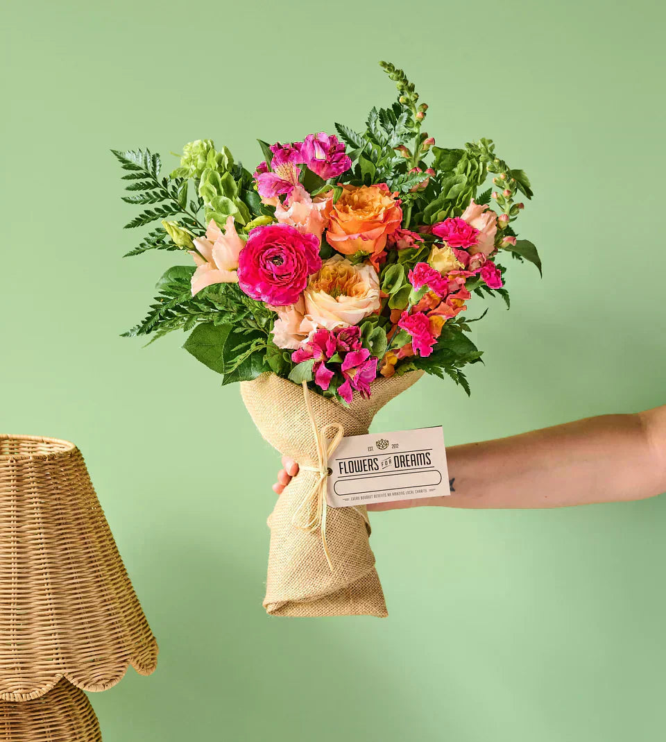 Flowers for Dreams' "Summer" bouquet featuring a vibrant mix of seasonal blooms in warm summer colors.