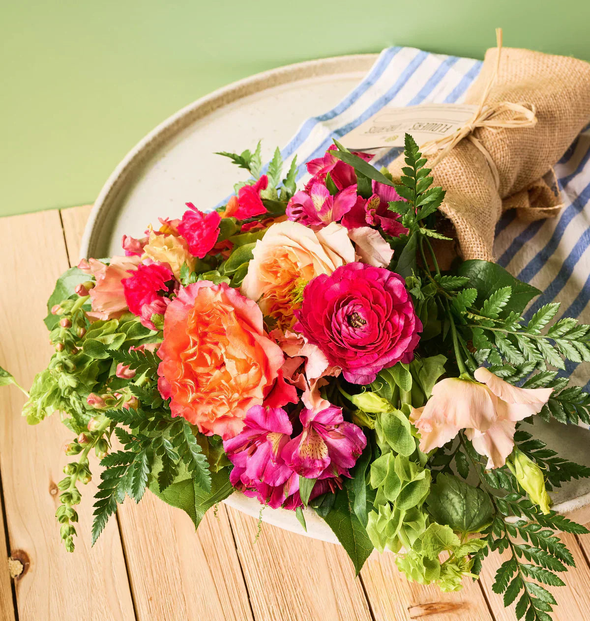 Flowers for Dreams summer bouquet featuring soft pink seasonal blooms inspired by July birth flowers.
