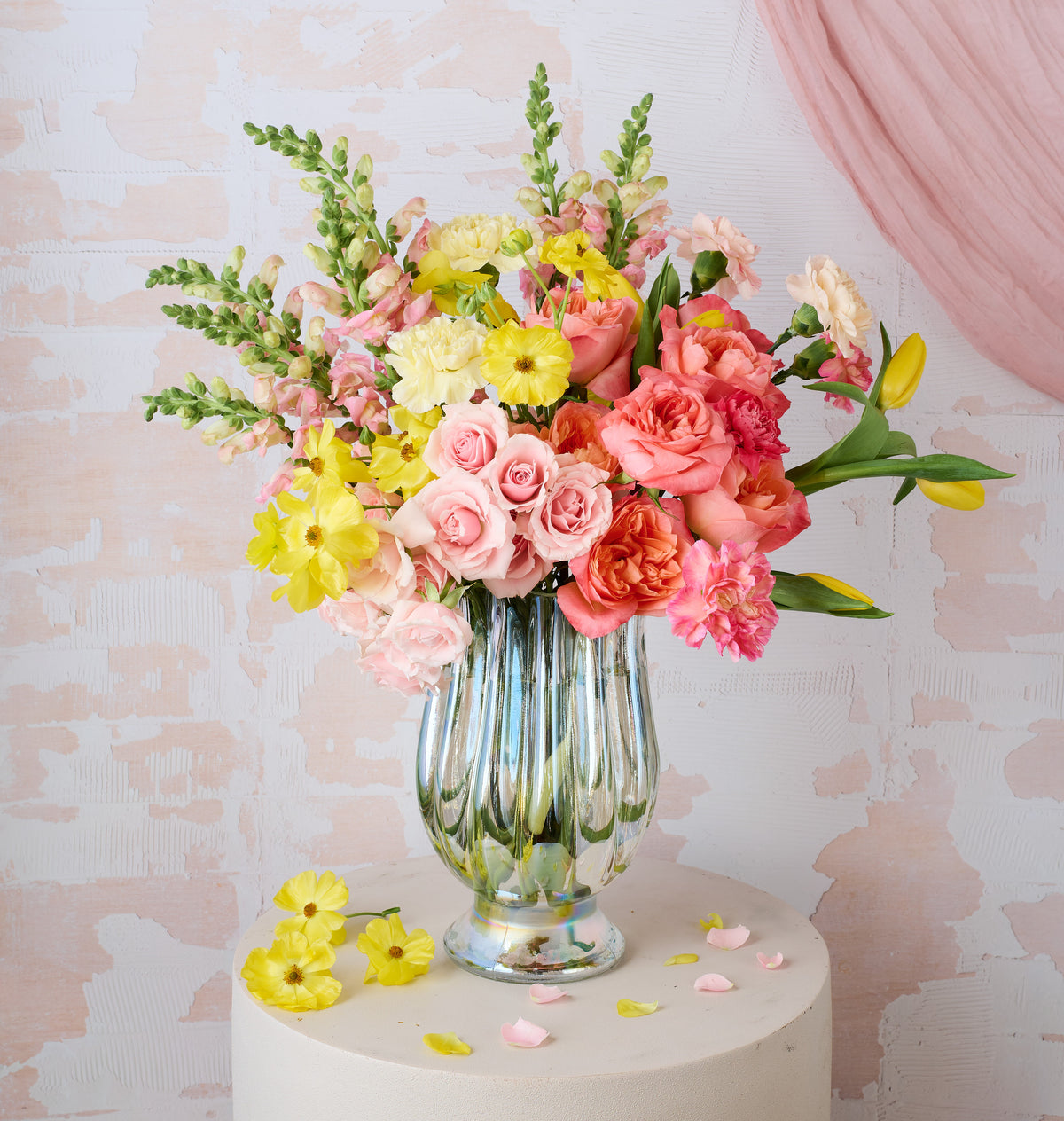 Vibrant sunflower-inspired bouquet with bold yellow blooms and fresh greenery arranged by Flowers for Dreams.
