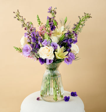 Lily bouquet with elegant seasonal flowers inspired by local spring festival arrangements