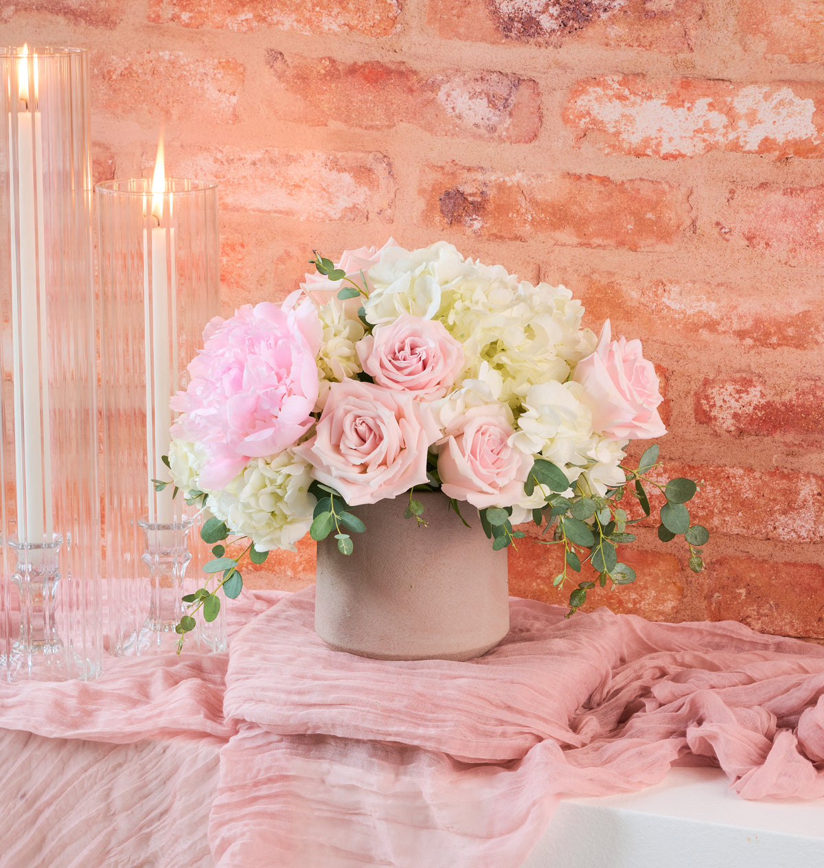 Grace bouquet with elegant seasonal flowers in soft pastel tones arranged in a handcrafted floral design
