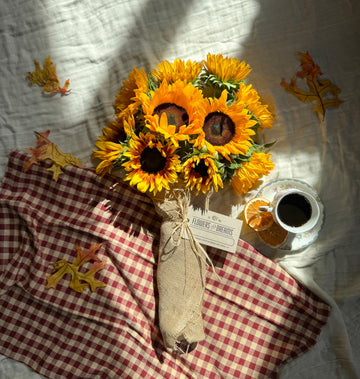 Sunflowers: Bright sunflower bouquet symbolizing joy and late-season light.