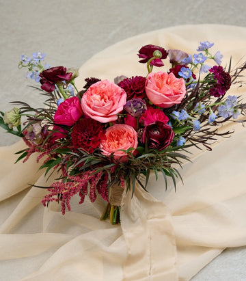 Jewel-toned avant-garde wedding flowers for a bold, unique look.